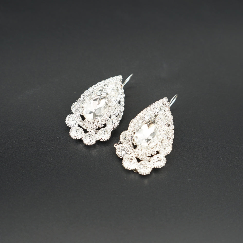 Boucle d'oreille modelé royale couleur blanc