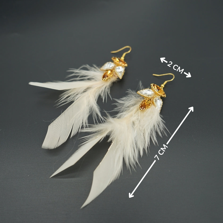 Boucles d’oreilles avec plumes doré et cristaux